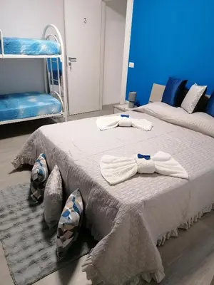 Letto o letti in una camera di Villa Porto fossa
