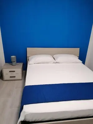 Letto o letti in una camera di Villa Porto fossa