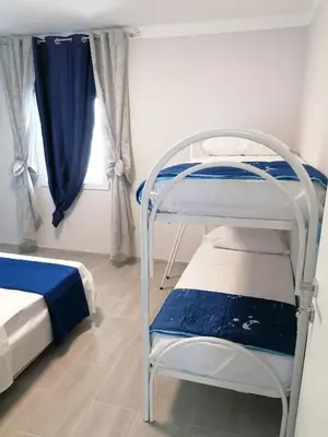 Letto o letti in una camera di Villa Porto fossa