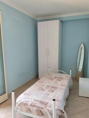 Letto o letti in una camera di Appartamento Angela