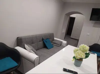 Area soggiorno di Casa Ortensia - Appartamento Moderno in Centro