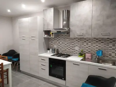 Cucina o angolo cottura di Casa Ortensia - Appartamento Moderno in Centro