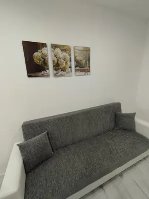 Area soggiorno di Casa Orchidea - Comfort minimal nel cuore di Palazzolo Acreide