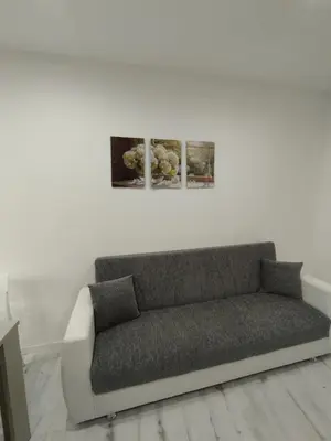 Area soggiorno di Casa Orchidea - Comfort minimal nel cuore di Palazzolo Acreide