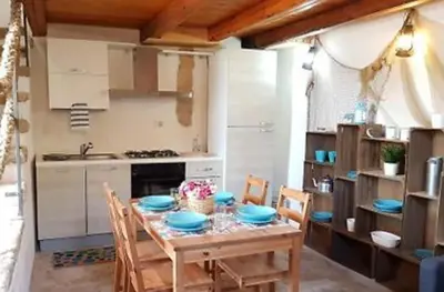 Cucina o angolo cottura di IL NIDO, Calamosche
