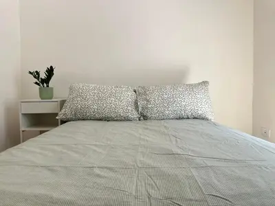 Letto o letti in una camera di Casa Garibaldi