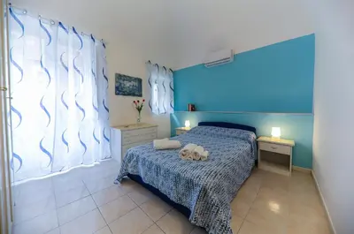 Letto o letti in una camera di Jole's Rooms