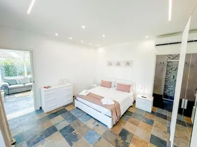 Letto o letti in una camera di Villa Sole Plemmirio