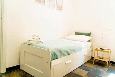 Letto o letti in una camera di Villa Sole Plemmirio