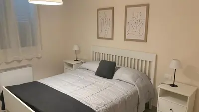 Letto o letti in una camera di HOLYDAY HOUSES Il CARRUBO