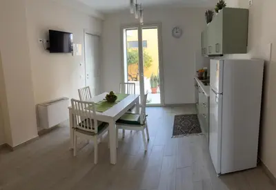 Cucina o angolo cottura di HOLYDAY HOUSES Il CARRUBO