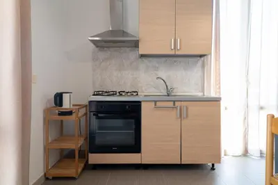 Cucina o angolo cottura di GuestHost - Santa Lucia Lovely Apartment