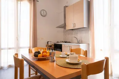 Cucina o angolo cottura di GuestHost - Santa Lucia Lovely Apartment