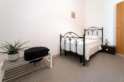 Letto o letti in una camera di GuestHost - Santa Lucia Lovely Apartment