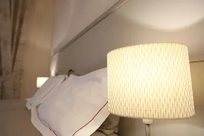 Letto o letti in una camera di B&B Elios Rooms