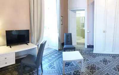 TV o dispositivi per l'intrattenimento presso varcOrtigia Bed and Breakfast
