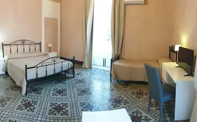Letto o letti in una camera di varcOrtigia Bed and Breakfast
