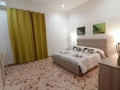 Letto o letti in una camera di Gioele House