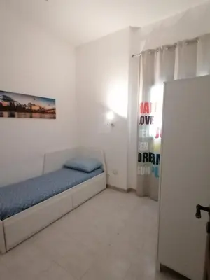 Letto o letti in una camera di Gioele House