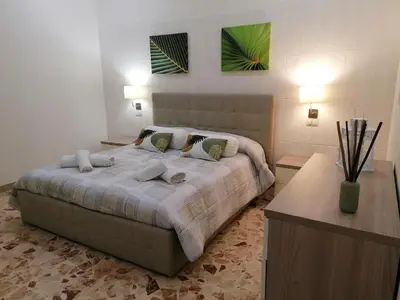Letto o letti in una camera di Gioele House