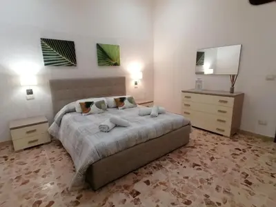 Letto o letti in una camera di Gioele House