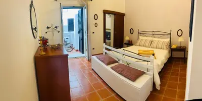 Letto o letti in una camera di Casa Vittoria
