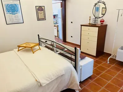 Letto o letti in una camera di Casa Vittoria