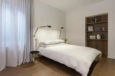 Letto o letti in una camera di Cozy Studio in Catania, 40 m², with air conditioning