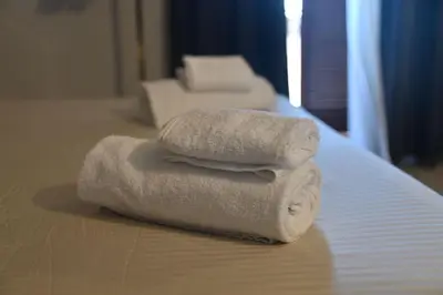 Letto o letti in una camera di B&B del Porto Catania