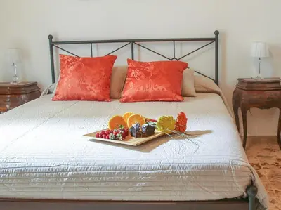 Letto o letti in una camera di Soffio del Libeccio B&B
