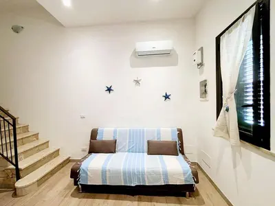 Letto o letti in una camera di A Nica