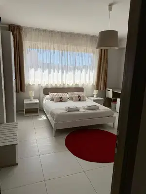 Letto o letti in una camera di Pietra Bianca Rooms