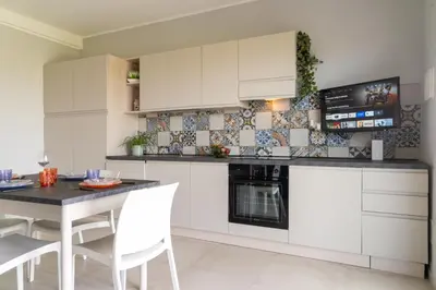 Cucina o angolo cottura di GuestHost - Borgo 84 Marzamemi - Isola Bella Apt