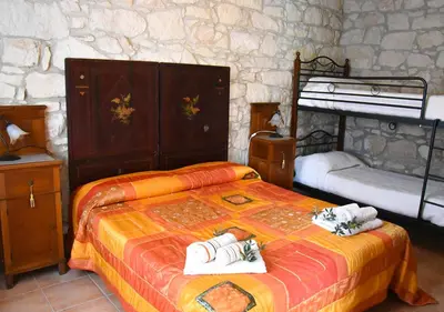 Letto o letti in una camera di Agriturismo Tenuta Carbonara