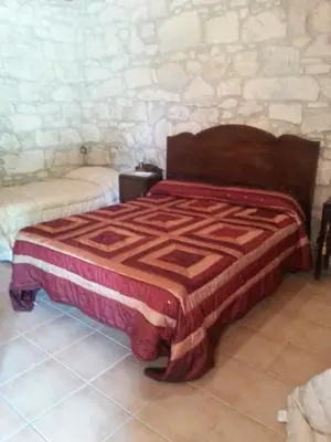 Letto o letti in una camera di Agriturismo Tenuta Carbonara
