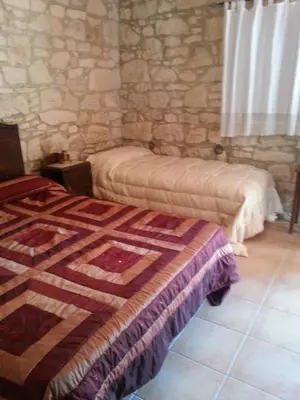 Letto o letti in una camera di Agriturismo Tenuta Carbonara