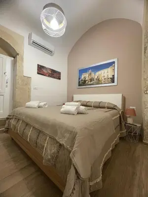 Letto o letti in una camera di Casa Ortigia KATY