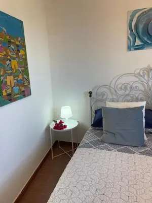 Letto o letti in una camera di Villa Bella