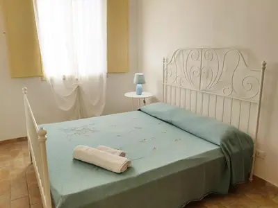 Letto o letti in una camera di Casa Vacanza Vendicari