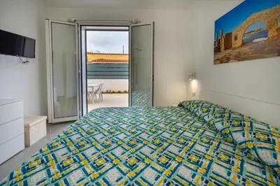 Letto o letti in una camera di O Molu