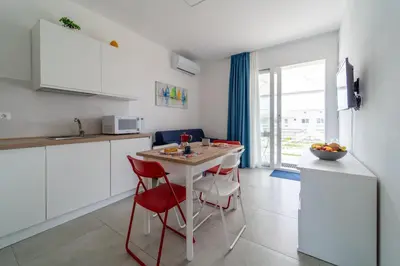 Cucina o angolo cottura di GuestHost - Borgo 84 Marzamemi - Le Vele Apt