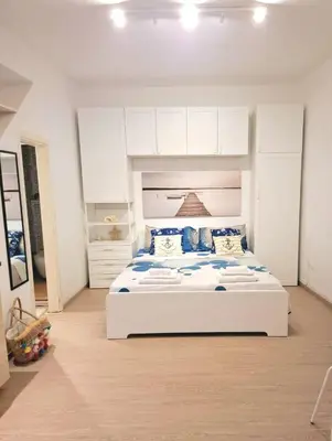 Letto o letti in una camera di La Casetta dei Paceri