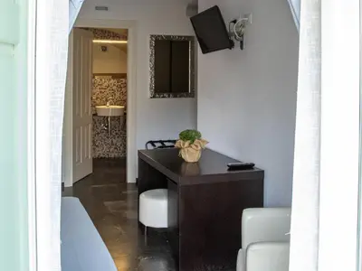 TV o dispositivi per l'intrattenimento presso Le Sirene B&B