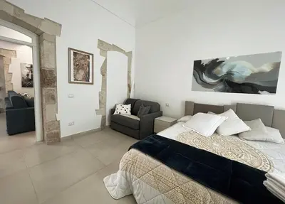 Letto o letti in una camera di Ambrogio House