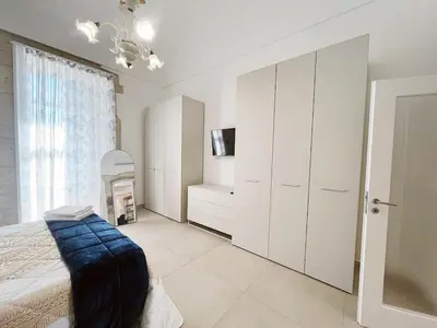 Letto o letti in una camera di Ambrogio House