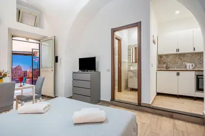 Cucina o angolo cottura di GuestHost - Storie di Lava e l'Angolo dell'Elefante Apartments