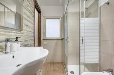 Bagno di GuestHost - Storie di Lava e l'Angolo dell'Elefante Apartments
