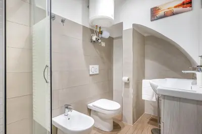Bagno di GuestHost - Storie di Lava e l'Angolo dell'Elefante Apartments