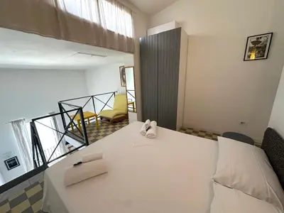 Letto o letti in una camera di Casalfeo by Ortigiaapartments