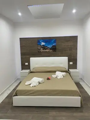 Letto o letti in una camera di A quel paese rooms